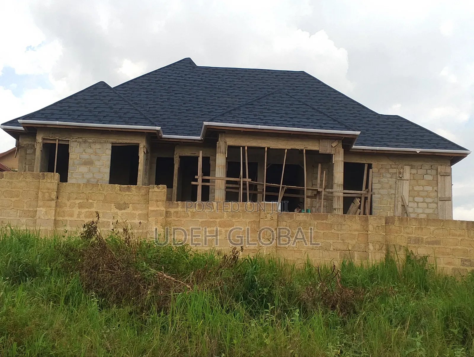 Wood Work & Metro Tile's Roofing Sheets and Rain Gutters Installation