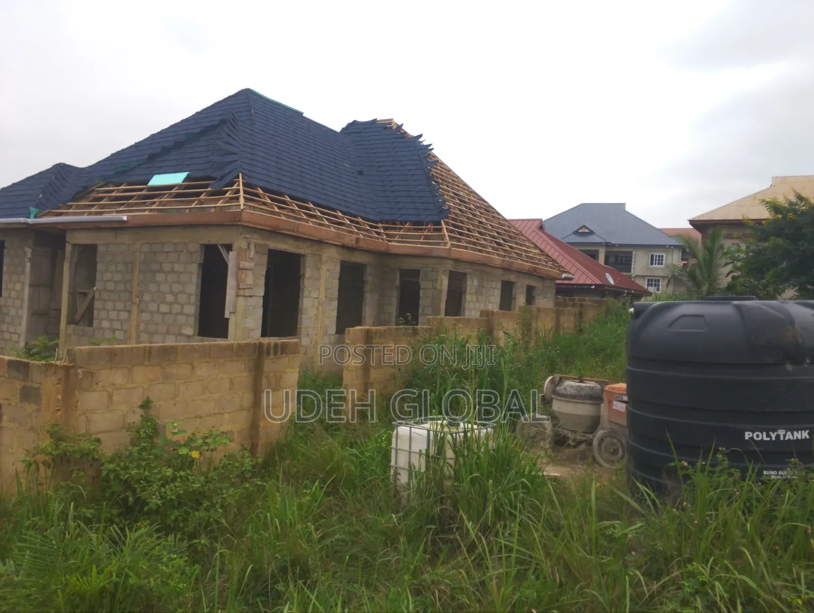 Wood Work & Metro Tile's Roofing Sheets and Rain Gutters Installation