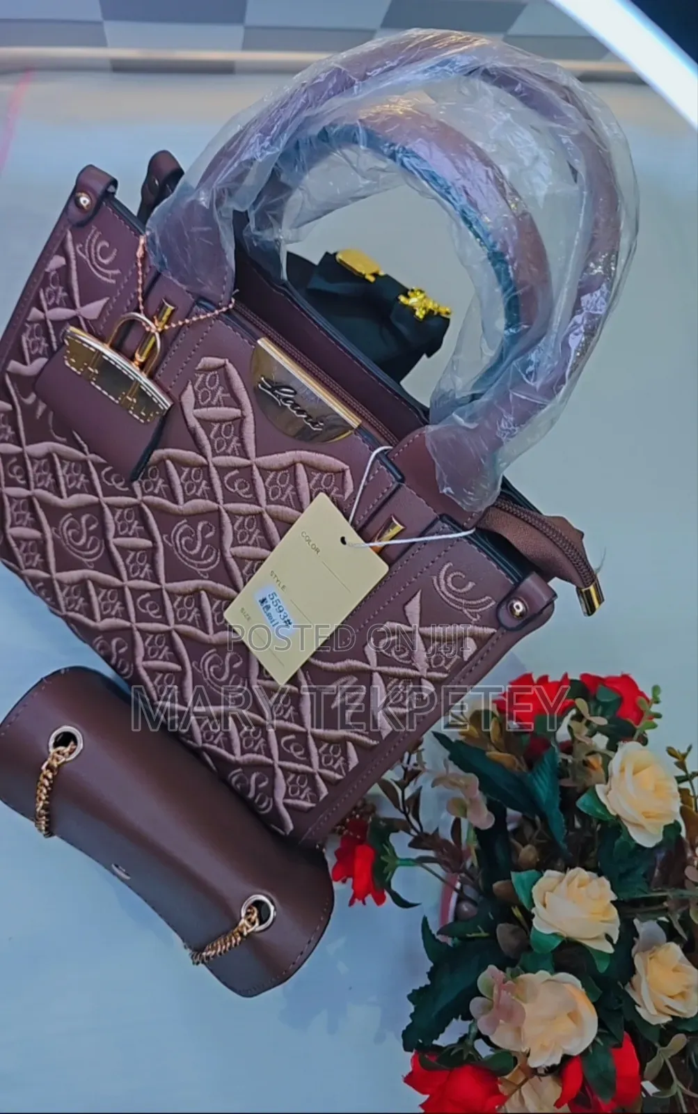 A Stylish Brown 2-in-1 Handbag With a Matching Mini Crossbody Bag