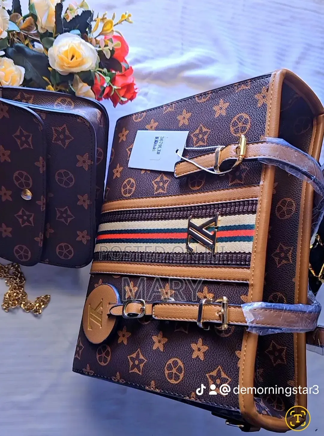 A Brown Patterned Handbag Set With a Matching Mini Shoulder Bag