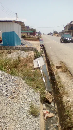 Registered 4 Plots of Land at Main Road Amasaman 3 Junction Cocobord