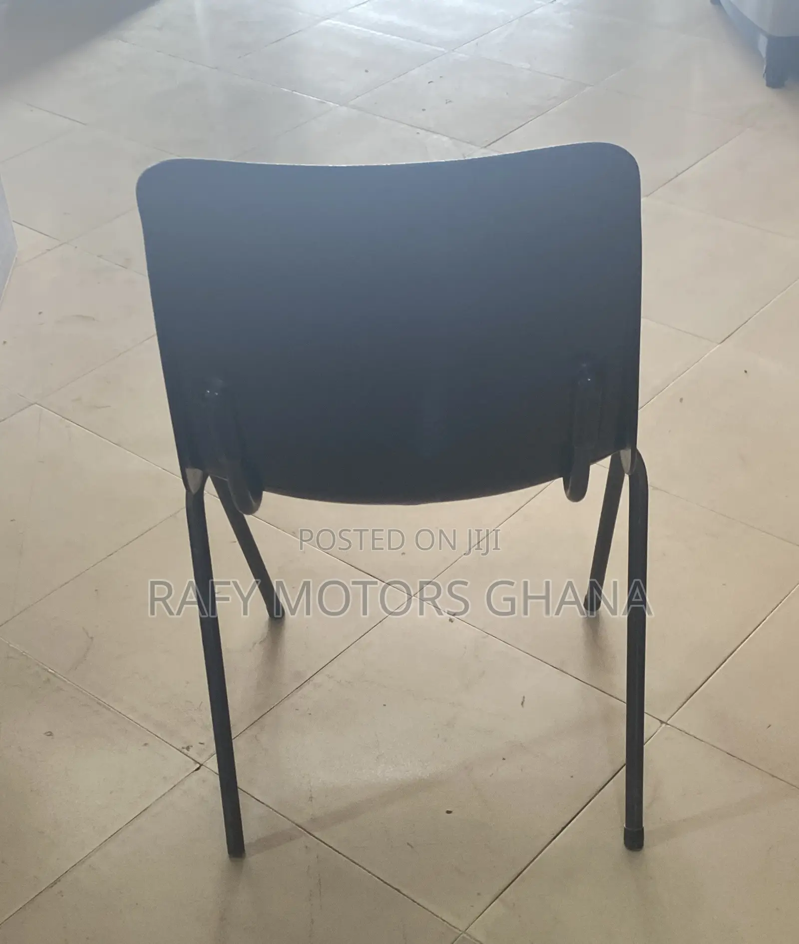 Black Plastic Four Legged Chair