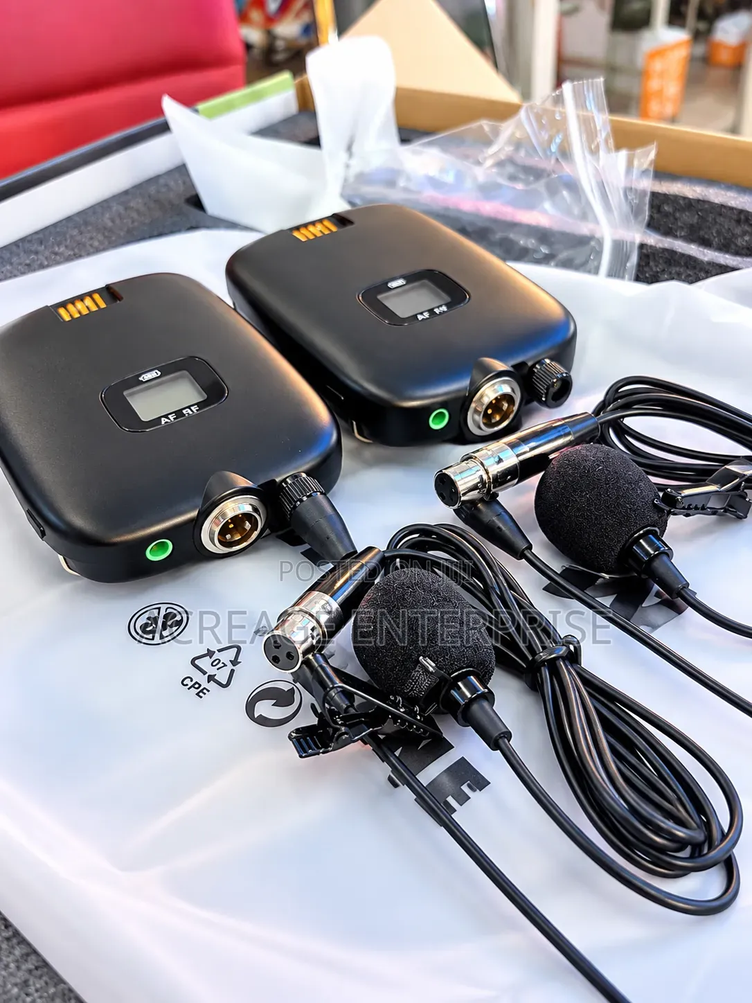 Shure SLXD Lapel Microphones or Clip-on Microphones.