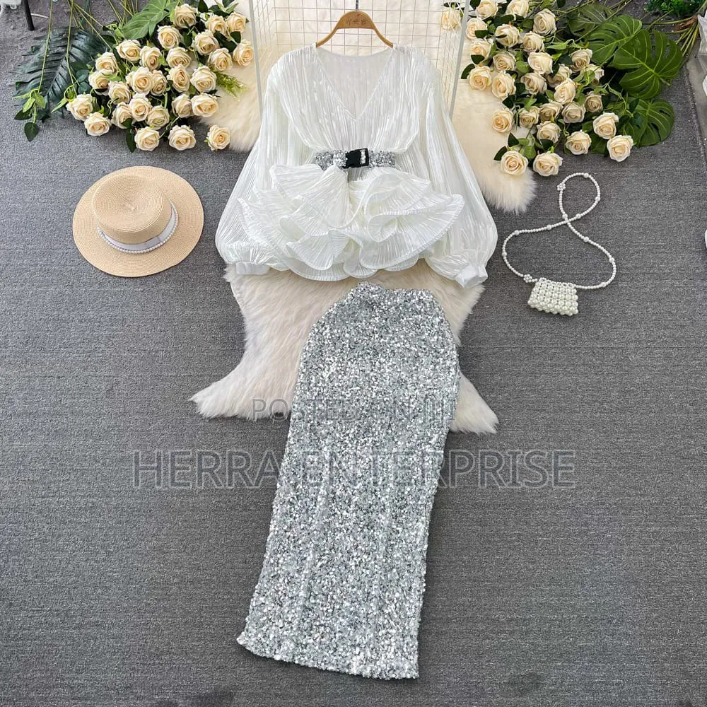 Elegant Two-Piece Outfit Features a White v-Neck Pleated Ruffle Blouse