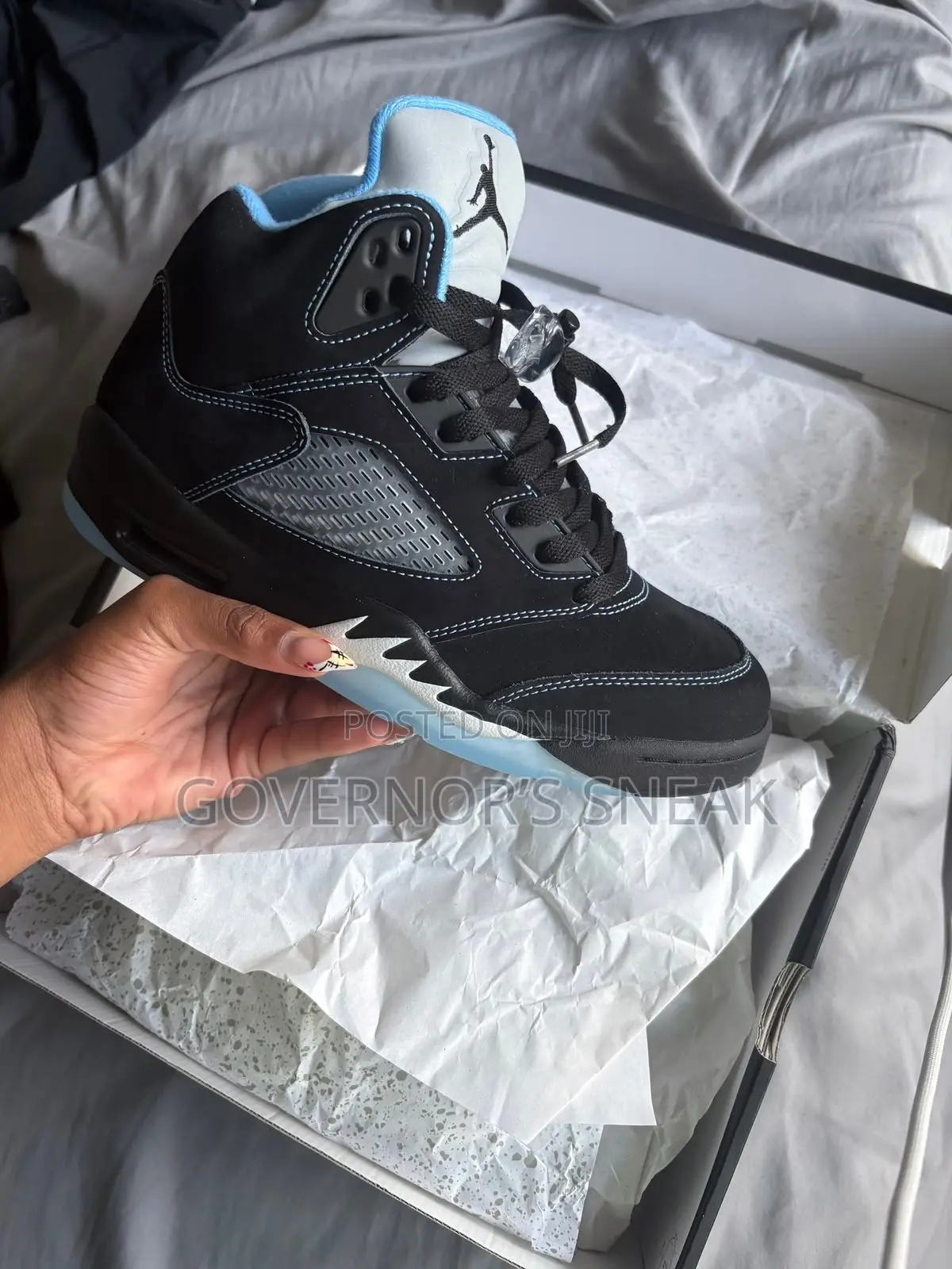 Jordan 4 Black Carolina