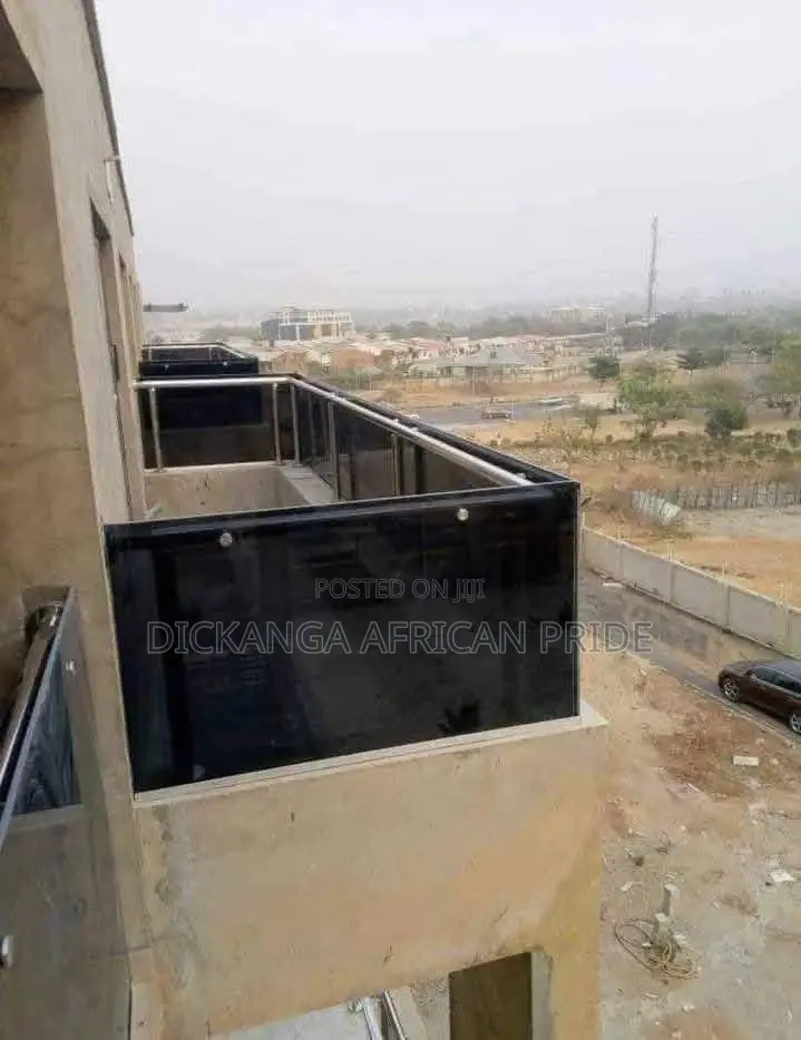 Glass Balustrade With Stainless Steel Handrails.