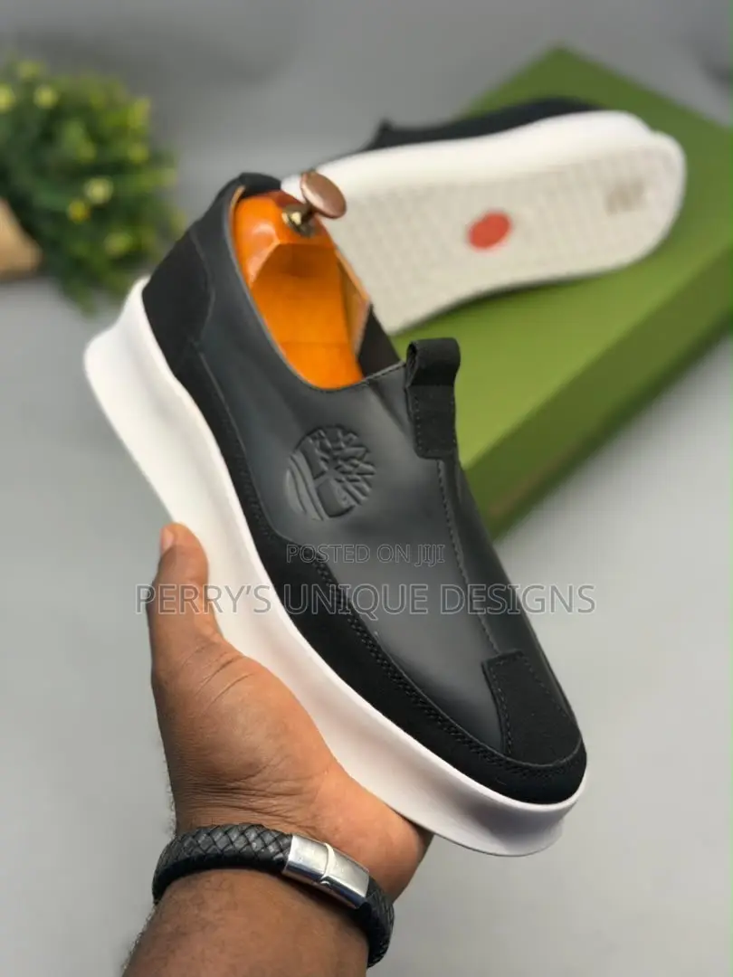 • Men's Timberland Slip-on – Black Leather Sneakers- White Sole