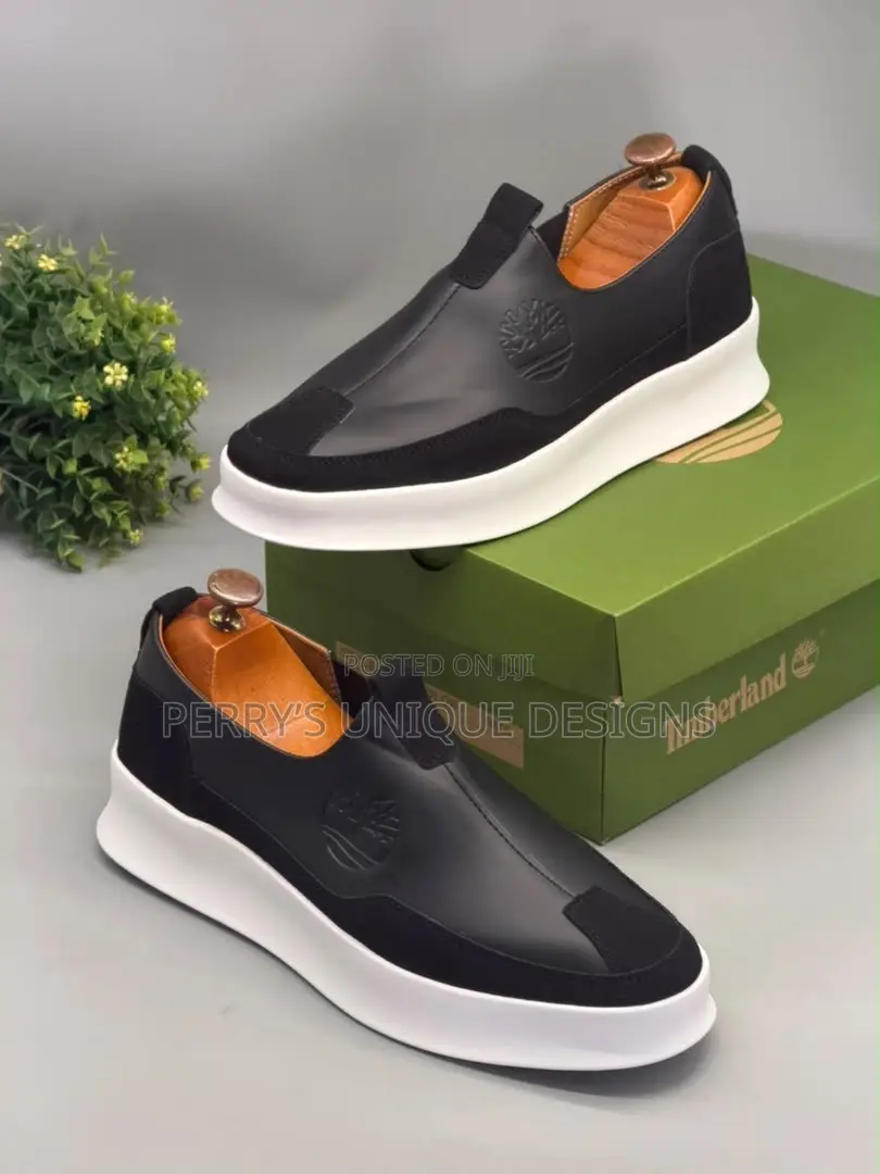 • Men's Timberland Slip-on – Black Leather Sneakers- White Sole