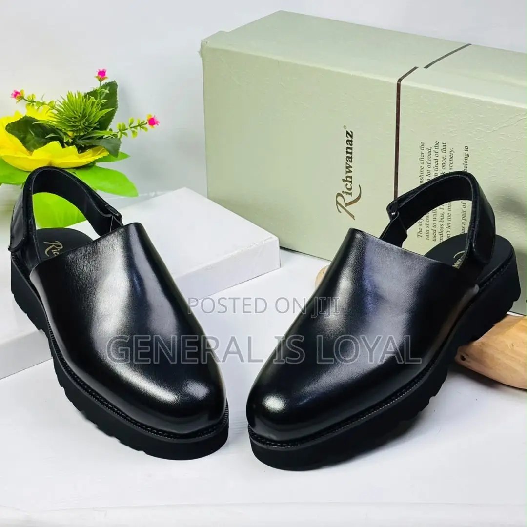 Richwanz Black Clog Mules Heel Strap and a Chunky Lug Sole.