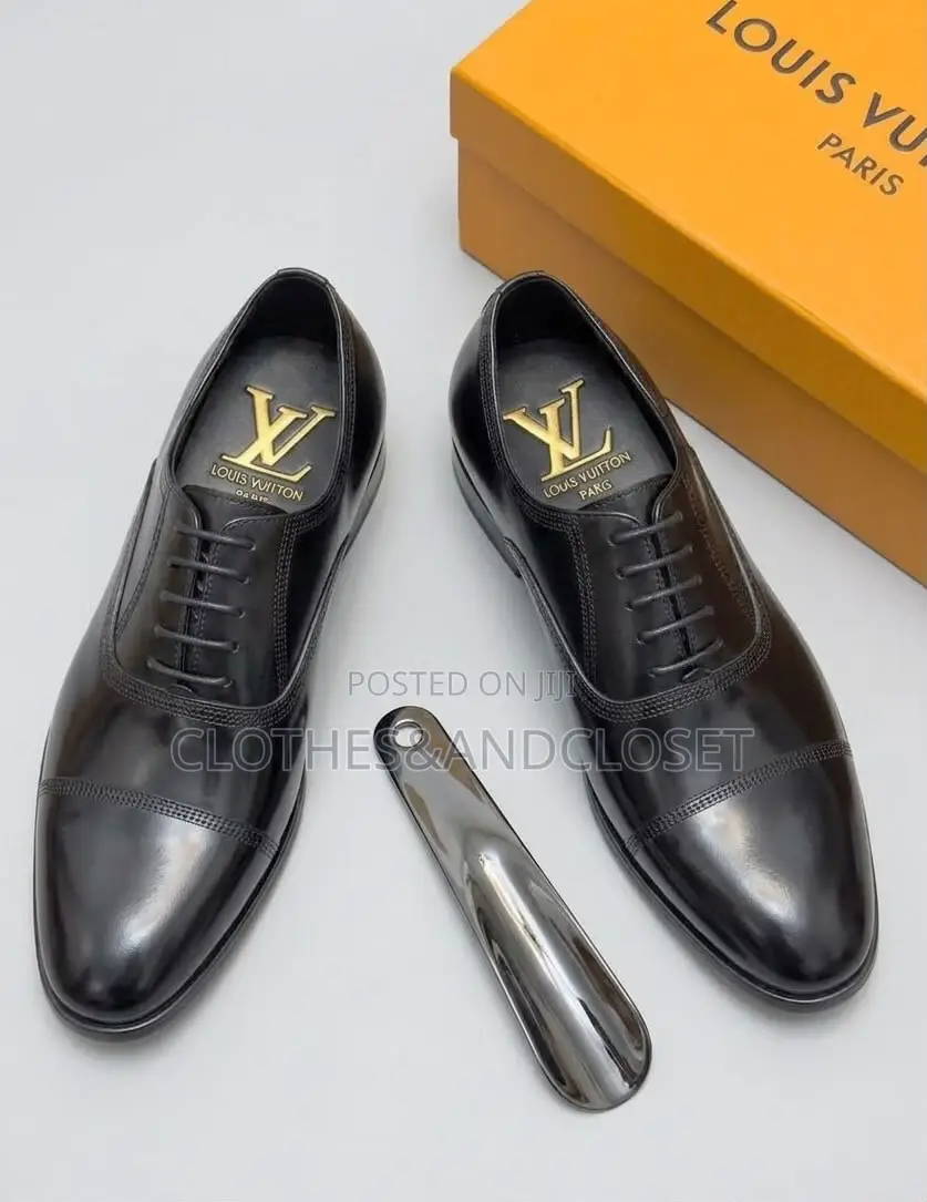 Black Leather Cap-Toe Lace-Up Oxfords Featuring Subtle Branding .