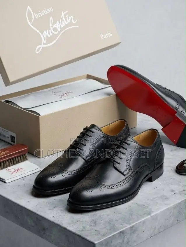 A Pair of Black Leather Wingtip Brogue Dress Shoes