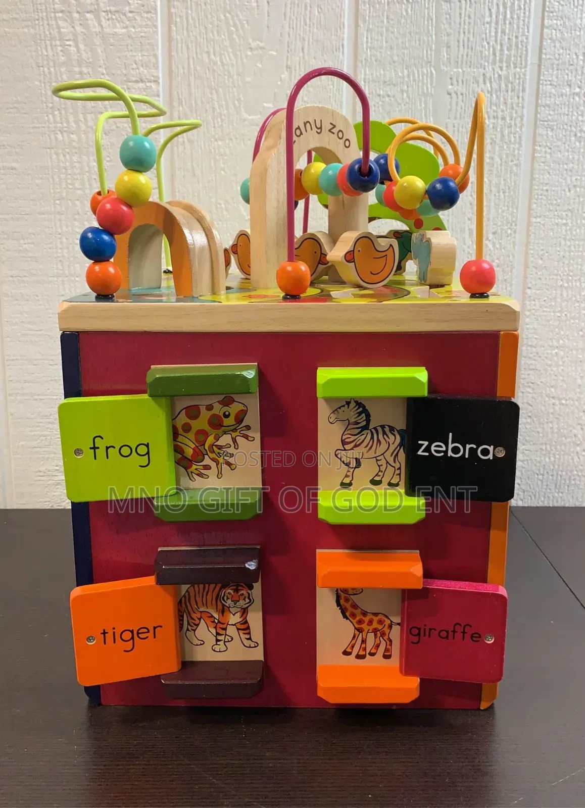 B. Toys Zany Zoo Wooden Activity Cube
