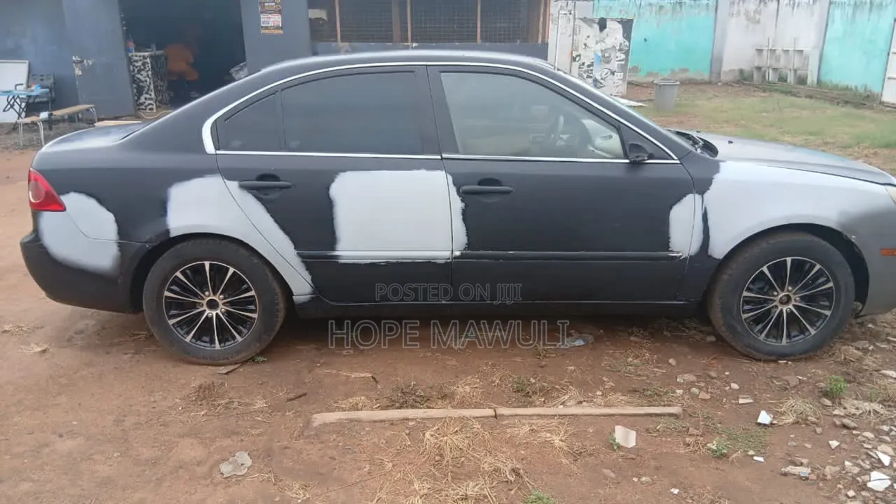 Kia Optima EX Sedan FWD (2.7L 6cyl 5A) 2010 Blue