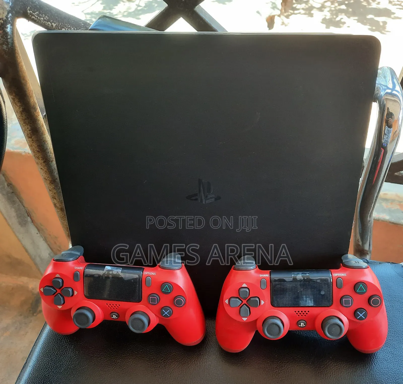 PS4 Slim With FC 27 and 7 Other Games + 2 Controllers