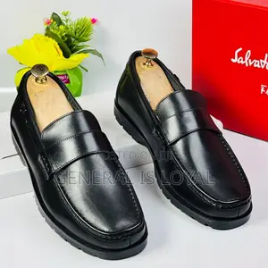 Ferragamo Black Corporate Penny Loafers With Chunky Lug Sole, Styled