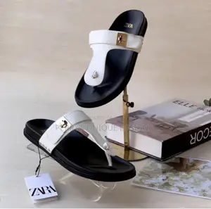 • Zara Women's Flat T-Strap - White Leather With Gold Hardware Clasp