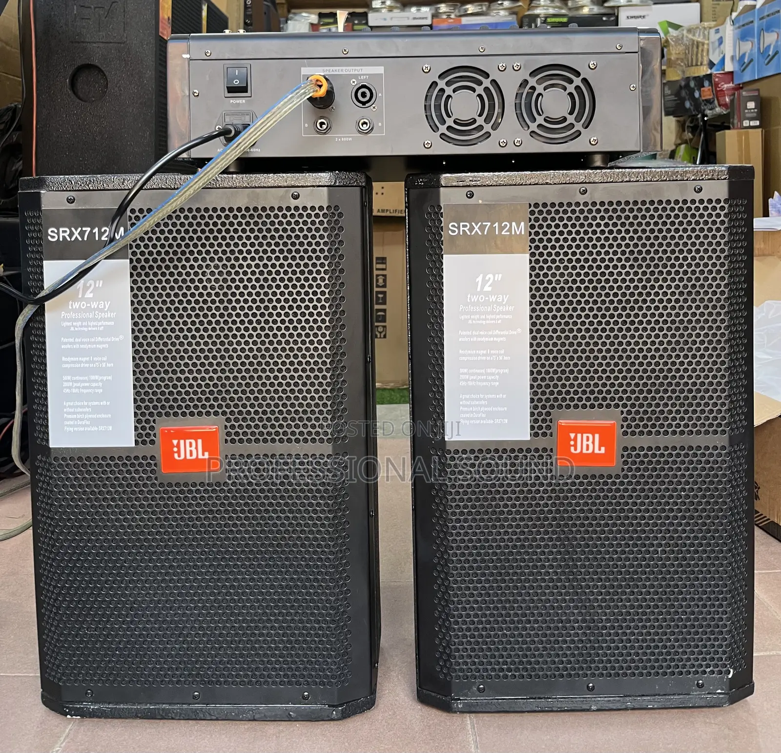 Pair of JBL SRX712M 12-Inch Two-Way Paired With a Power Amplifier