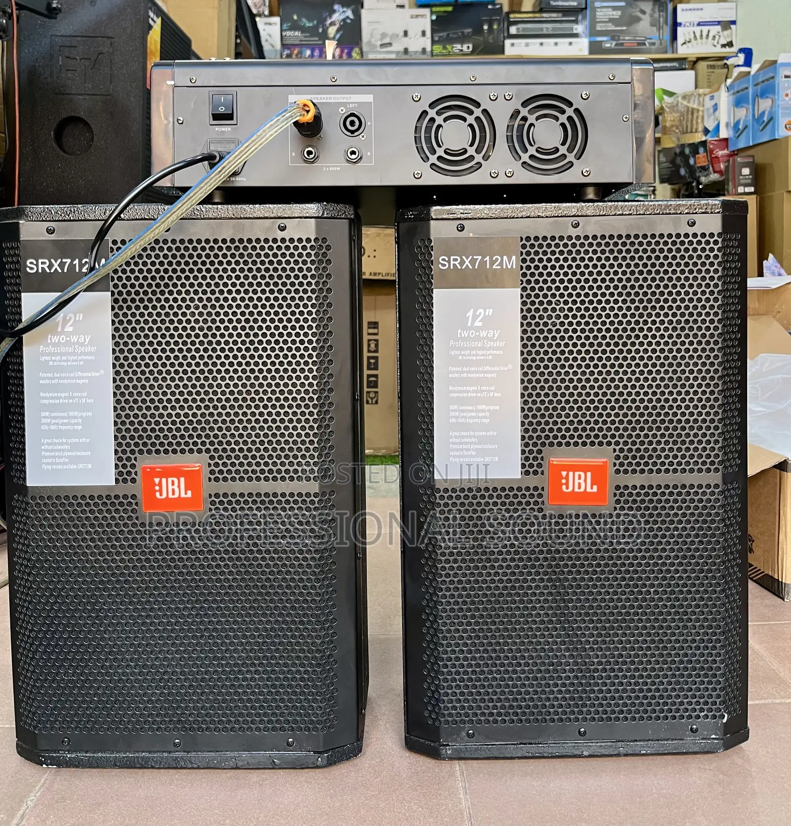 Pair of JBL SRX712M 12-Inch Two-Way Paired With a Power Amplifier