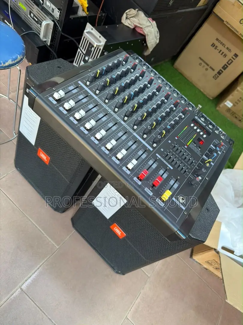 Pair of JBL SRX712M 12-Inch Two-Way Paired With a Power Amplifier