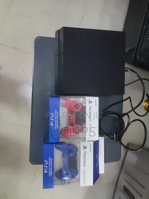 PS4 With Two Controllers and Games