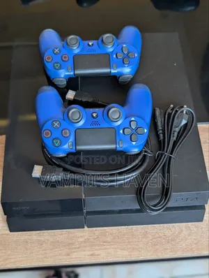 PS4 With 2 Controllers 8 Games HDMI Cable and Controller Charger
