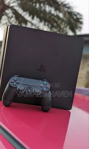 PS4 SLIM With 2 Controllers FC27 and All Games