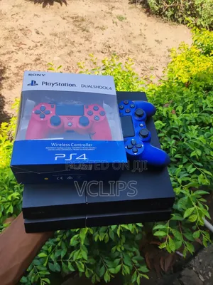 PS4 With Two Controllers and Games