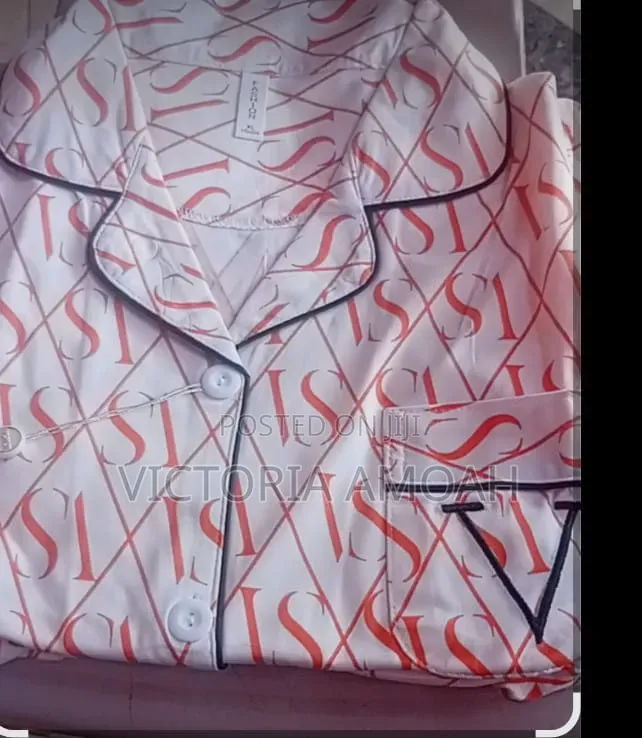 A Short-Sleeve Button-Down Pink Pajama.
