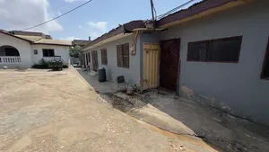 100/100 Plot of Land for Sale With 6 Bedroom Old House at TAIFA