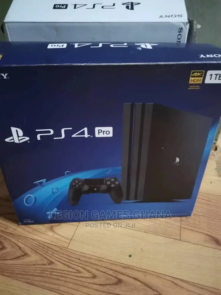 Playstation 4 Pro in Box With Games